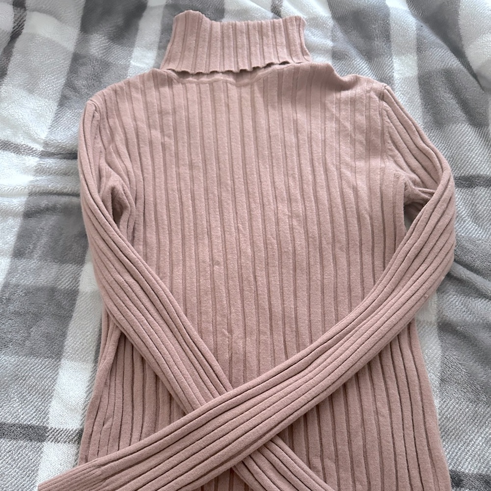Medium light pink very soft turtle neck sweater.